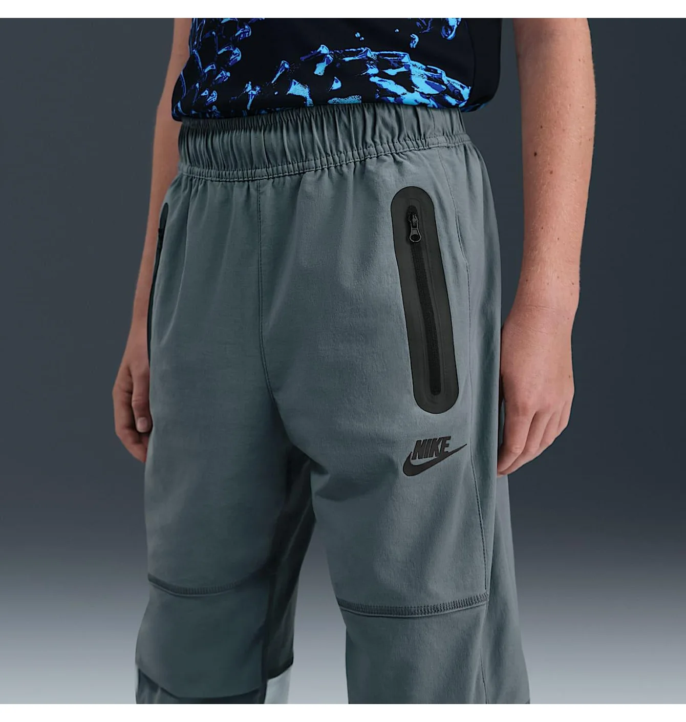 Штани дитячі Nike Tech Big Kids Woven Pants Grey HQ8921-084