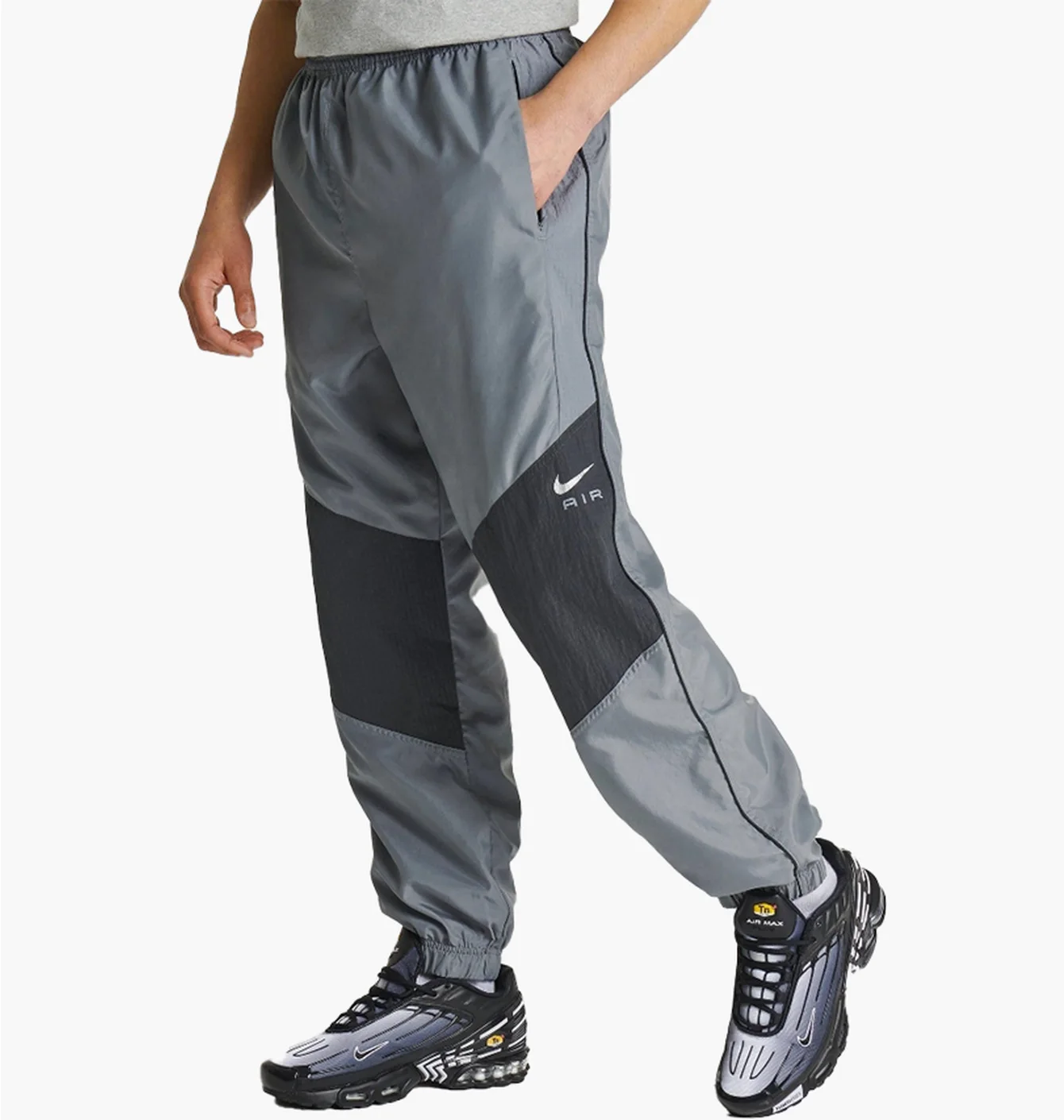 Штани чоловічі Nike Air Swoosh Woven Track Pants Grey FN7688-065