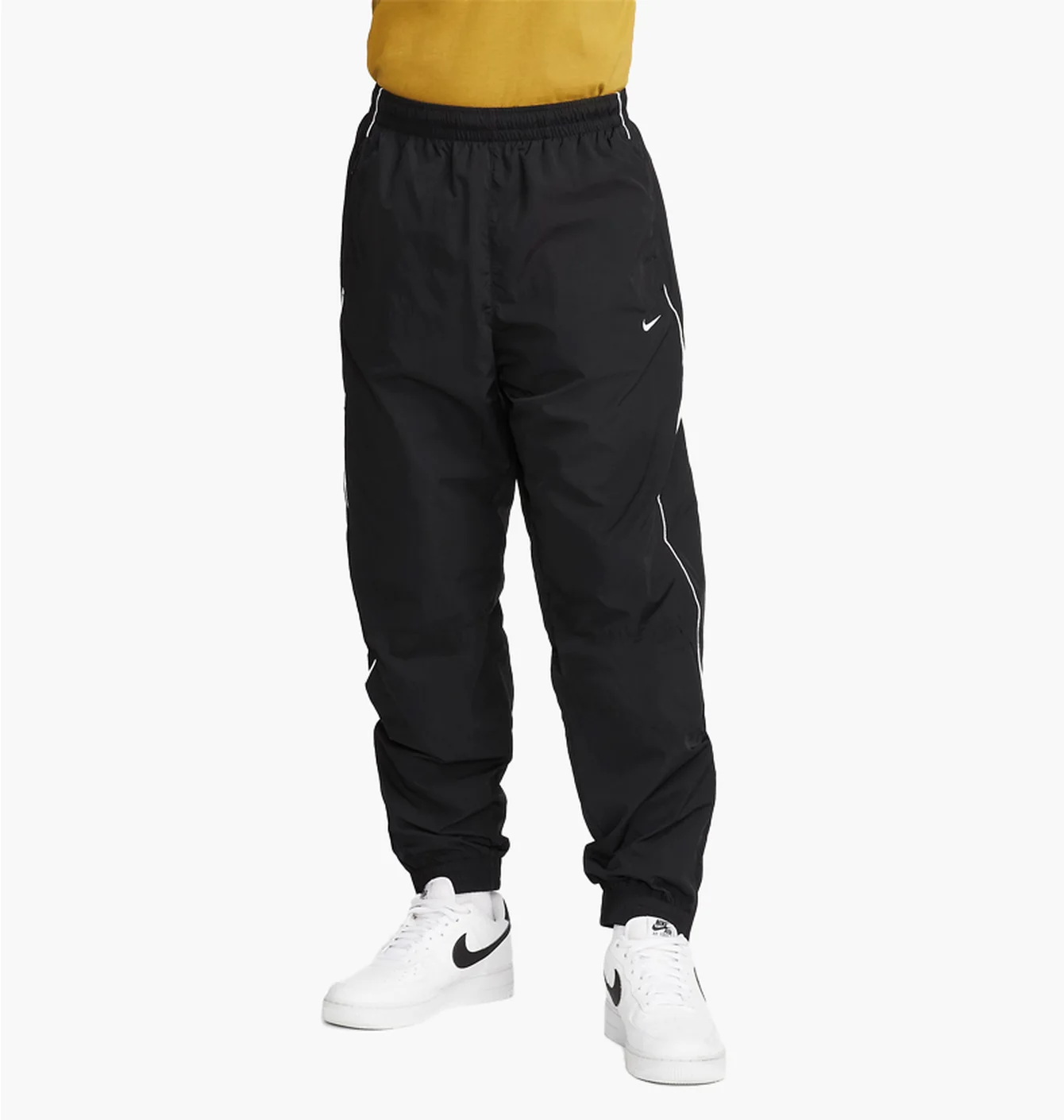 Штани чоловічі Nike Solo Swoosh MenS Track Pants Black FB8620-010